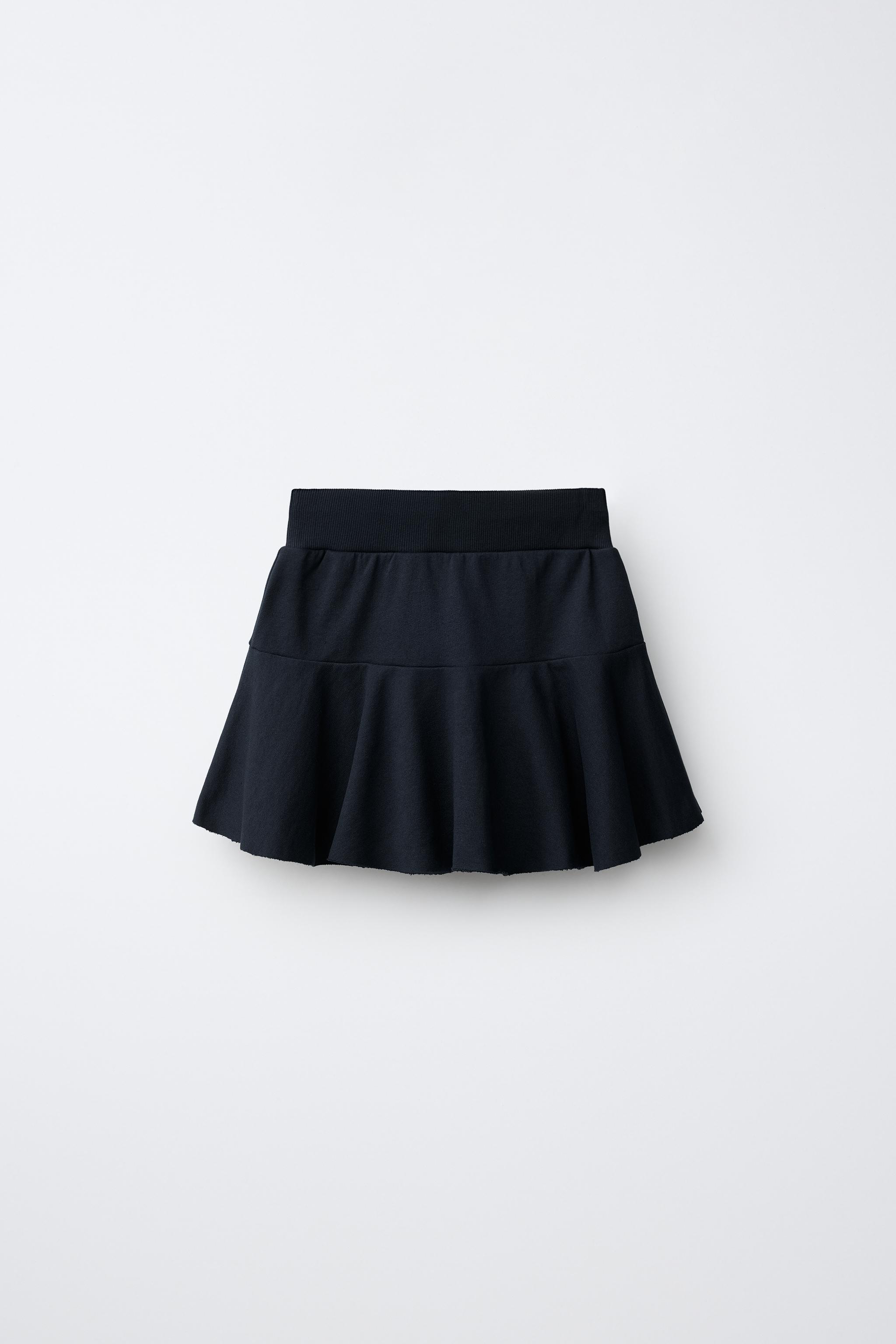 NY EMBROIDERED RUFFLE SKORT